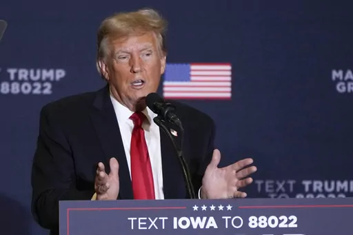 Former President Donald Trump speaks during a commit to caucus rally, Dec. 13, 2023, in Coralville, Iowa. Trump's lawyers are pressing to have special counsel Jack Smith's team held in contempt. The Republican former president's lawyers said Thursday, Jan. 4, 2024, prosecutors have taken steps to advance the 2020 election interference case against him in violation of a judge's order that put the case on hold. (AP Photo/Charlie Neibergall)