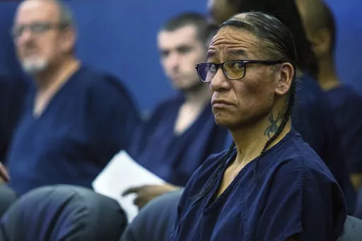 Nathan Chasing Horse sits in court, April 3, 2023, in Las Vegas. The former "Dances with Wolves" actor has been charged in Alberta, Canada, with sexual assault and sexual exploitation. The new charges come months after Chasing Horse was arrested by Las Vegas police and indicted in a sweeping sexual abuse case accusing him of crimes spanning two decades, multiple states and two countries. He now faces criminal sexual assault charges in at least five jurisdictions. (AP Photo/Ty O'Neil, File)