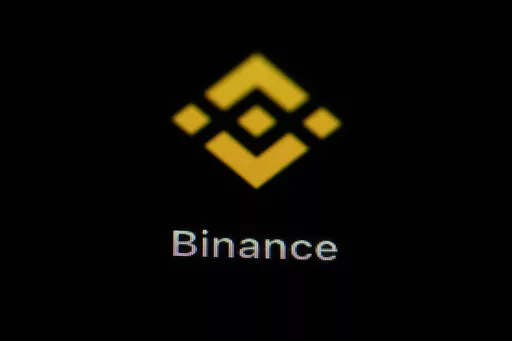 The Binance app icon is seen on a smartphone, Feb. 28, 2023, in Marple Township, Pa. The U.S. Securities and Exchange Commission and Binance have reached an agreement in court, Saturday, June 17, that lets the world's largest cryptocurrency exchange continue to operate in the United States as it battles SEC fraud charges. (AP Photo/Matt Slocum, File)