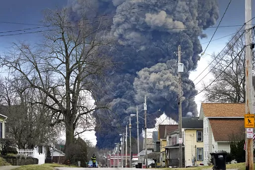 A plume rises over East Palestine, Ohio, as a result of the controlled detonation of a portion of the derailed Norfolk Southern trains, Feb. 6, 2023. After the catastrophic train car derailment in East Palestine, Ohio, some officials are raising concerns about a type of toxic substance that tends to stay in the environment. (AP Photo/Gene J. Puskar, File)