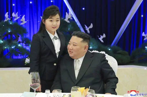 In this photo provided by the North Korean government, North Korean leader Kim Jong Un and his daughter attend a feast to mark the 75th founding anniversary of the Korean People’s Army at an unspecified place in North Korea Tuesday, Feb. 7, 2023. Independent journalists were not given access to cover the event depicted in this image distributed by the North Korean government. The content of this image is as provided and cannot be independently verified. Korean language watermark on image as pr