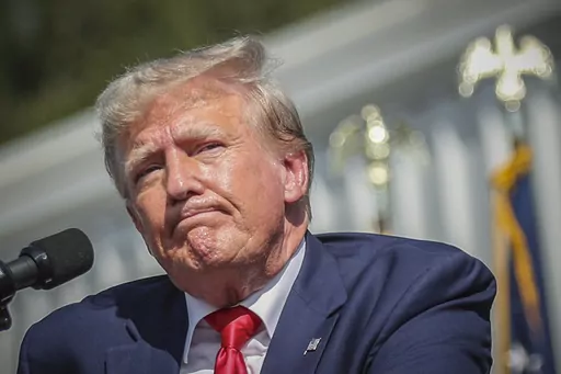 Former President Donald Trump pauses before ending his remarks at a rally in Summerville, S.C., Sept. 25, 2023. A New York judge ruled, Tuesday, Sept. 26, 2023, that the former president and his company committed fraud for years while building the real estate empire that catapulted him to fame and the White House. (AP Photo/Artie Walker Jr., File)