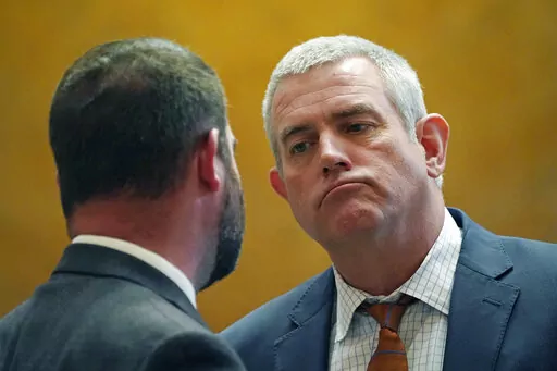 Speaker Philip Gunn, R-Clinton, right, listens to Rep. Kevin Felsher, R-Biloxi in the House Chamber, Monday, March 28, 2022, at the Mississippi Capitol in Jackson. (AP Photo/Rogelio V. Solis)