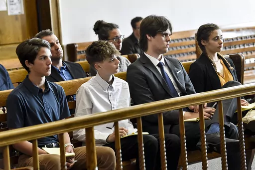 Plaintiffs Mica, 14; Badge 15, Lander 18, and Taleah, 19, listen to arguments during a status hearing on May 12, 2023, in Helena, Mont., for a case that they and other Montana youth filed against the state arguing Montana officials are not meeting their constitutional obligations to protect residents from climate change. The first-of-its-kind trial begins Monday, June 12, 2023, before District Court Judge Kathy Seeley in Helena. It is scheduled to last for two weeks. (Thom Bridge/Independent Rec