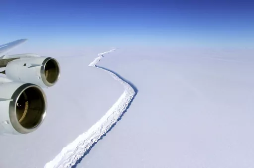 This Nov. 10, 2016 photo released by NASA, shows a rift in the Antarctic Peninsula's Larsen C ice shelf. Dozens of Antarctica’s ice shelves, floating extensions of glaciers, showed significant shrinking between 1997 and 2021, a study published Thursday, Oct. 12, 2023, found. (John Sonntag/NASA via AP, File)
