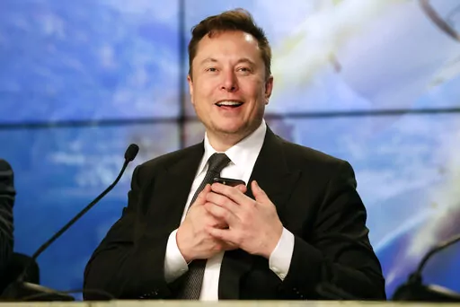 Elon Musk founder, CEO, and chief engineer/designer of SpaceX speaks during a news conference after a Falcon 9 SpaceX rocket test flight at the Kennedy Space Center in Cape Canaveral, Fla, Jan. 19, 2020. Musk won't be joining Twitter's board of directors as previously announced. The tempestuous billionaire remains Twitter’s largest shareholder. (AP Photo/John Raoux, File)