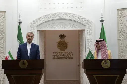 In this picture released by the Iranian Foreign Ministry, Iran's Foreign Minister Hossein Amirabdollahian, left, speaks during a joint news briefing with his Saudi Arabian counterpart Prince Faisal bin Farhan Al Saud in Riyadh, Saudi Arabia, Thursday, Aug. 17, 2023. Iran's foreign minister traveled to Saudi Arabia on Thursday, marking the first trip to the kingdom by Tehran's top diplomat in years after the two nations reached a détente with Chinese mediation. (Iranian Foreign Ministry via AP)