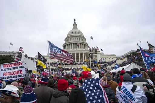 Rioters loyal to President Donald Trump rally at the U.S. Capitol in Washington on Jan. 6, 2021. Federal prosecutors say Taylor Taranto, 37, who prosecutors say participated in the Jan. 6, 2021 riot at the U.S. Capitol and arrested last week near the home of former President Barack Obama, told followers on his YouTube live stream that he was looking to get a “good angle on a shot” and that he was trying to locate the “tunnels underneath their houses” shortly before he was taken into cust