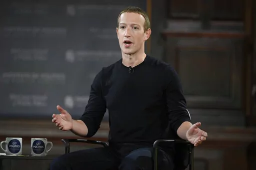 Facebook CEO Mark Zuckerberg speaks at Georgetown University in Washington, Thursday, Oct. 17, 2019. Facebook parent Meta is laying off 11,000 people, about 13% of its workforce, as it contends with faltering revenue and broader tech industry woes, Zuckerberg said in a letter to employees Wednesday. (AP Photo/Nick Wass, File)