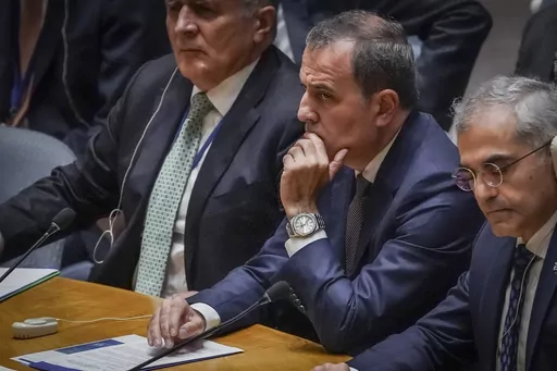 Azerbaijan's Foreign Minister Jeyhun Bayramov, center, listens during a United Nations Security Council meeting on the conflict between Armenia and Azerbaijan, Thursday Sept. 21, 2023 at U.N. headquarters. (AP Photo/Bebeto Matthews)