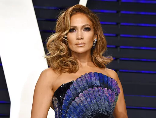 Jennifer Lopez arrives at the Vanity Fair Oscar Party on Feb. 24, 2019, in Beverly Hills, Calif. Lopez will be honored for her film and television achievements at the MTV Movie & TV Awards. The network announced Friday that Lopez will receive the Generation Award on Sunday in Santa Monica, Calif. (Photo by Evan Agostini/Invision/AP, File)