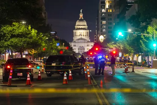 Austin police investigate a homicide shooting that occurred at a demonstration against police violence in downtown Austin, Texas, July 25, 2020. A U.S. Army sergeant was convicted of murder for fatally shooting an armed protester in 2020 during nationwide protests against police violence and racial injustice, a Texas jury ruled Friday, April 7, 2023. Sgt. Daniel Perry was working for a ride-sharing company in July 2020 when he turned onto a street and into a large crowd of demonstrators in downt