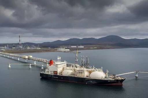 The tanker Sun Arrows loads its cargo of liquefied natural gas from the Sakhalin-2 project in the port of Prigorodnoye, Russia, on Oct. 29, 2021. For the U.S. at least, removing Russia's most favored nation status is a mostly symbolic gesture. The U.S. ban that was announced last month on imports of Russian oil, gas and coal already eliminated about 60% of all U.S. imports from Russia.  (AP Photo/File)