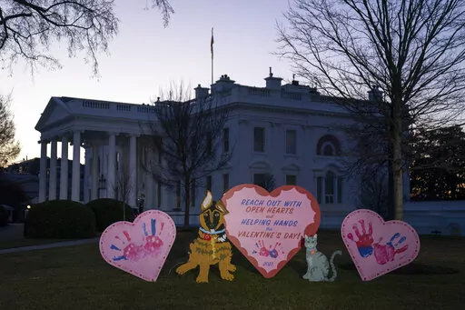 Valentine's Day decorations adorn the White House lawn, Tuesday, Feb. 14, 2023, in Washington. (AP Photo/Evan Vucci)