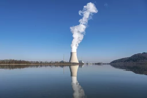 Water vapor rises from the nuclear power plant Isar II in Essenbach, Germany, March 3, 2022. Germany is shutting down this nuclear power plant and two others on Saturday, April, 2023, as part of an energy transition agreed by successive governments. (Armin Weigel/dpa via AP, File)