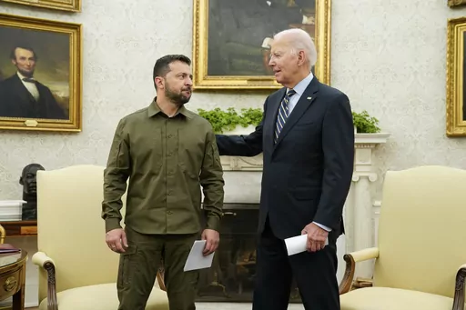 President Joe Biden meets with Ukrainian President Volodymyr Zelenskyy in the Oval Office of the White House, Sept. 21, 2023, in Washington. The White House says Biden has been in touch with U.S. allies and partners to discuss continued support for Ukraine in its fight against Russia. Tuesday's conversation came after Biden signed legislation late Saturday to keep the U.S. government funded. (AP Photo/Evan Vucci, File)