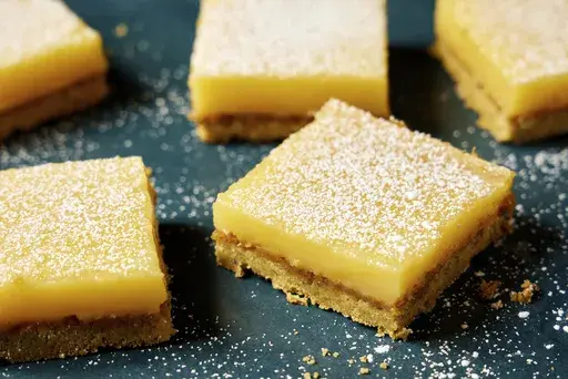 This image released by Milk Street shows a recipe for lemon and pistachio bars. (Milk Street via AP)