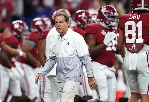 Alabama coach Nick Saban watches players warm up for the College Football Playoff championship NCAA football game against Georgia on  Jan. 10, 2022, in Indianapolis. Saban is concerned about the current state of college football. He recently told The Associated Press "I don't think what we’re doing right now is a sustainable model.” (AP Photo/Paul Sancya, File)
