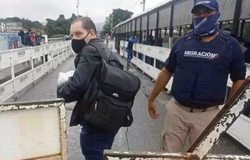 In this photo provided by the Kenemore family, Jerrel Kenemore stands at a Colombian checkpoint in the middle of the Simon Bolivar international bridge connecting San Antonio del Tachira, Venezuela with Villa del Rosario, Colombia, the second week of March 2022. Kenemore, from the Dallas area, is one of at least three American citizens who were quietly arrested in 2022 allegedly trying to enter Venezuela illegally and are being held at a maximum security prison facing long sentences, The Associa