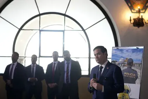 U.S. Secretary of State Marco Rubio speaks after a tour of a migrant return center and a demonstration of a dog trained to sniff out narcotics, at La Aurora International Airport in Guatemala City, Wednesday, Feb. 5, 2025. (AP Photo/Mark Schiefelbein, Pool)