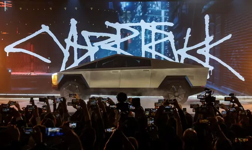 The Tesla Cybertruck is unveiled at Tesla's design studio Thursday, Nov. 21, 2019, in Hawthorne, Calif. On Saturday, July 15, 2023, Tesla said its first production Cybertruck electric pickup has rolled off the assembly line in Texas, nearly two years behind the original schedule. (AP Photo/Ringo H.W. Chiu, File)