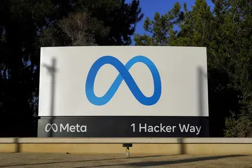 Meta's logo is seen on a sign at the company's headquarters in Menlo Park, Calif., Nov. 9, 2022. Meta has agreed to a $1.4 billion settlement with Texas in a privacy lawsuit over claims that the tech giant used biometric data of users without their permission, state officials said Tuesday, July 30, 2024. (AP Photo/Godofredo A. Vásquez, File)