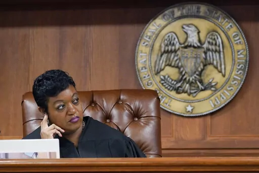 Hinds County Chancery Judge Crystal Wise Martin listens as lawyer Rob McDuff, attorney for Parents For Public Schools, presents arguments in a lawsuit that says the state violates its own constitution with a grant program for private schools, during a hearing in Jackson, Miss., Aug. 23, 2022. Judge Martin on Thursday, Oct. 13, 2022, blocked a state law that put $10 million of federal pandemic relief money into infrastructure grants for private schools. (AP Photo/Rogelio V. Solis, File)