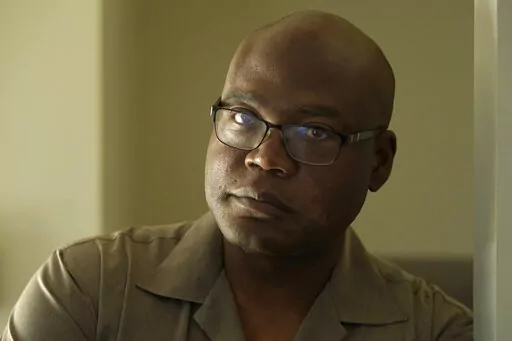 Terrence Hersey stands for a portrait at his home Friday, June 17, 2022, in South Holland, Ill. Hersey underwent extensive rehabilitation for a stroke in 2015, before his doctors eventually cleared him to return to work in 2016. But Union Pacific decided without ever having a doctor examine him that the stroke made him unfit to work for the railroad. Union Pacific has already lost three lawsuits over the way it dismisses employees with health conditions because of safety concerns, and the prospe