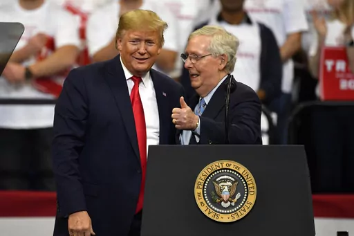 Then President Donald Trump, left, and Senate Majority Leader Mitch McConnell of Ky., greet each other during a campaign rally in Lexington, Ky., Nov. 4, 2019. McConnell has endorsed Donald Trump for president. McConnell announced his decision after Super Tuesday wins pushed Trump, who is the GOP front-runner, closer to the party nomination. It’s a remarkable turnaround for McConnell, who has blamed Trump for “disgraceful” acts in the Jan. 6, 2021, attack on the Capitol. (AP Photo/Timothy 