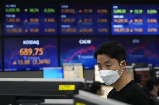 A currency trader watches monitors at the foreign exchange dealing room of the KEB Hana Bank headquarters in Seoul, South Korea, Thursday, Sept. 29, 2022. Asian stock markets have followed Wall Street higher after Britain’s central bank moved forcefully to stop a budding financial crisis. (AP Photo/Ahn Young-joon)