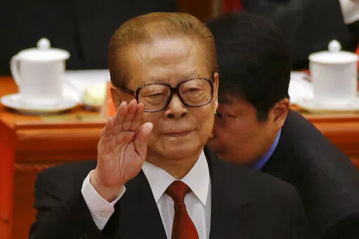 Former Chinese President Jiang Zemin gestures during the opening session of the 18th Communist Party Congress held at the Great Hall of the People in Beijing, China, Thursday, Nov. 8, 2012. Jiang has died Wednesday, Nov. 30, 2022, at age 96. (AP Photo/Ng Han Guan, File)
