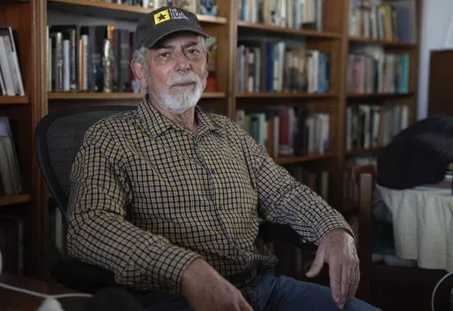 Journalist Gustavo Gorriti poses for a portrait at his home in Lima, Peru, Friday, April 26, 2024. Gorriti, 75, is one of Latin America’s most storied journalists with more than four decades of investigative reporting that exposed high-level abuse of power in Peru and abroad. (AP Photo/Martin Mejia)
