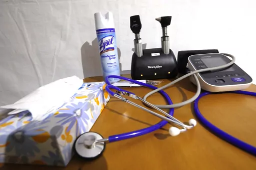 A stethoscopes and blood pressure monitor on set on a rolling rolling table at the University of Mississippi Medical Center in Jackson, Miss., Wednesday, April 8, 2020. Concierge medicine, a business model in which patients pay a membership fee to have a direct relationship with a doctor — used to feel like something just for the well-to-do. But as fees have come down and frustration with traditional primary care has gone up, concierge services are getting more attention. (AP Photo/Rogelio V. 