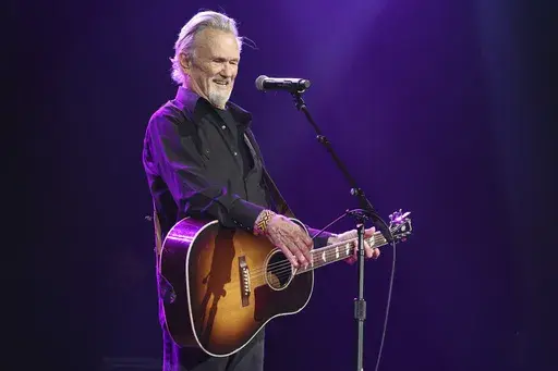 Artist and songwriter Kris Kristofferson performs "Sunday Morning Coming Down" at the Nashville Songwriters Association International "50 Years of Songs" at the Ryman Auditorium, Sept. 20, 2017, in Nashville, Tenn. (Photo by Laura Roberts/Invision/AP, File)