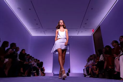 A Brandon Maxwell collection is modeled during Fashion Week, Tuesday, Sept. 13, 2022, in New York. (AP Photo/Julia Nikhinson)