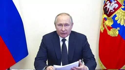 In this photo taken from video released by the Russian Presidential Press Service, Russian President Vladimir Putin speaks via videoconference at the Novo-Ogaryovo residence outside Moscow, Russia, Wednesday, March 16, 2022. (Russian Presidential Press Service via AP, File)