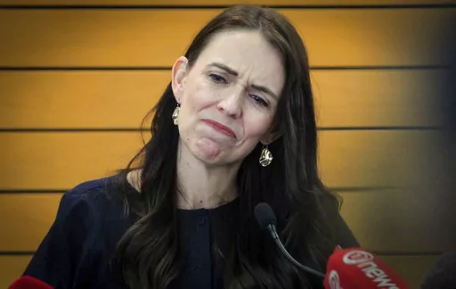 New Zealand Prime Minister Jacinda Ardern grimaces as she announces her resignation at a press conference in Napier, New Zealand Thursday, Jan. 19, 2023. Ardern says that she will not contest this year's general elections. (Warren Buckland/New Zealand Herald via AP)