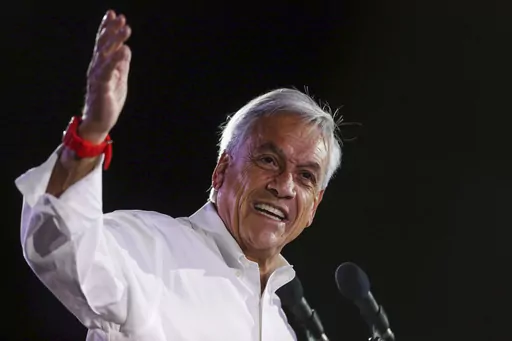 Sebastian Pinera, former Chilean president who is running again for office, addresses supporters at his closing campaign rally in Santiago, Chile, Nov. 16, 2017. Piñera died on Tuesday, Feb. 6, 2024 in a helicopter crash in Lago Ranco, Chile, according to Chilean Interior Minister Carolina Tohá who announced it on live TV. (AP Photo/Luis Hidalgo, File)