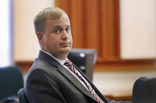 Former Idaho state Rep. Aaron von Ehlinger glances toward the gallery during his rape trial at the Ada County Courthouse on April 27, 2022, in Boise, Idaho. A former legislative intern is suing von Ehlinger who was convicted of raping her and one of his colleagues for releasing her name and launching a harassment campaign. The young woman, who uses the pseudonym "Jane Doe" in the federal lawsuit, was just 19 when she reported that then-Rep. Aaron von Ehlinger raped her at his Boise, Idaho, apart