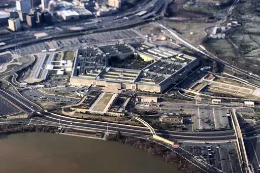 The Pentagon is seen in this aerial view made through an airplane window in Washington, Jan. 26, 2020. Reports of sexual assaults across the U.S. military jumped by 13% last year, driven by significant increases in the Army and the Navy as bases began to move out of pandemic restrictions and public venues opened back up. (AP Photo/Pablo Martinez Monsivais, File)