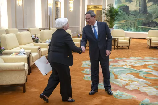 Chinese Premier Li Qiang, right, shakes hands with Treasury Secretary Janet Yellen, left, during a meeting at the Great Hall of the People in Beijing, China, Friday, July 7, 2023. (AP Photo/Mark Schiefelbein, Pool)