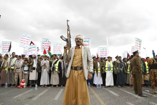 Houthi supporters attend a rally against the U.S.-led airstrikes on Yemen and in support of the Palestinians in the Gaza Strip on Yemen, in Sanaa, Yemen, Friday, Feb. 09, 2024. Despite a month of U.S.-led airstrikes, Yemen's Iranian-backed Houthi rebels have launched attacks seriously damaging a ship in the crucial Bab el-Mandeb Strait and apparently bringing down an American drone worth tens of millions of dollars. (AP Photo/Osamah Abdulrahman, File)