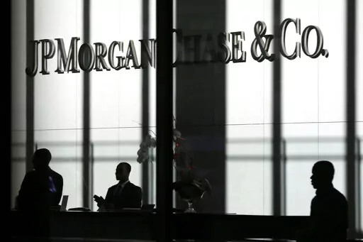The JPMorgan Chase & Co. logo is displayed at their headquarters in New York on Oct. 21, 2013. You'll no longer be able to store your precious coins, jewelry and paperwork at JPMorgan Chase & Co., as the bank has stopped opening new safety deposit boxes for customers. A spokesman for the bank said Chase decided late last year to stop offering new deposit boxes to customers as a “business decision” but declined to share specifics. (AP Photo/Seth Wenig, File)