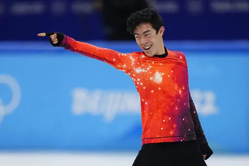 Nathan Chen, of the United States, competes in the men's free skate program during the figure skating event at the 2022 Winter Olympics, Thursday, Feb. 10, 2022, in Beijing. (AP Photo/David J. Phillip)