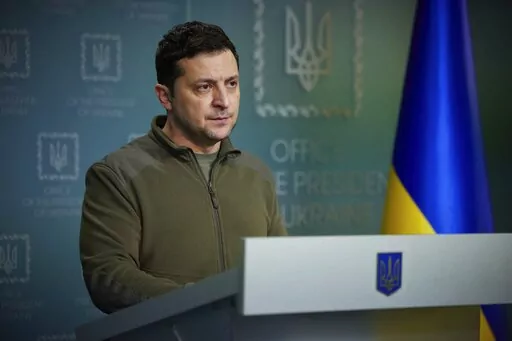In this photo provided by the Ukrainian Presidential Press Office, Ukrainian President Volodymyr Zelenskyy delivers his speech addressing the nation in Kyiv, Ukraine, Friday, Feb. 25, 2022. Russian troops bore down on Ukraine's capital Friday, with explosions and gunfire sounding in the city as the invasion of a democratic country fueled fears of wider war in Europe and triggered new international efforts — including direct sanctions on President Vladimir Putin — to make Moscow stop. (Ukrain