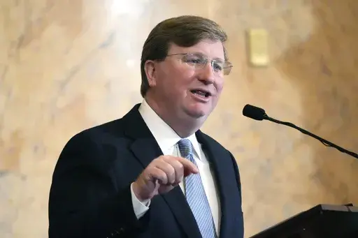 Mississippi Republican Gov. Tate Reeves delivers his State of the State address to the Mississippi State Legislature, Feb. 26, 2024, at the state Capitol in Jackson, Miss. State lawmakers from Mississippi and Alabama are playing each other in softball this weekend to raise money for charity. And, the two Republican governors are placing friendly bets on the outcome. The Battle of Tombigbee takes place Saturday, June 22 at Trustmark Park in the Jackson suburb of Pearl, to raise money for Children
