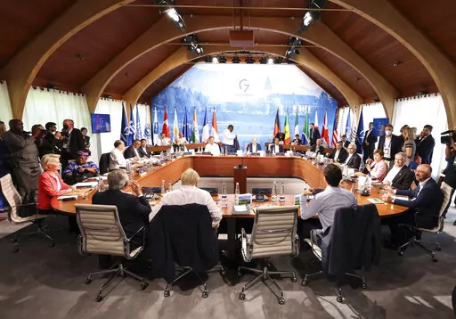 A general view of a G7 leaders meeting with outreach guests as part of the working session of the G7 leaders summit at Castle Elmau in Kruen, near Garmisch-Partenkirchen, Germany, on Monday, June 27, 2022. The Group of Seven leading economic powers are meeting in Germany for their annual gathering Sunday through Tuesday. (Lukas Barth/Pool Photo via AP)