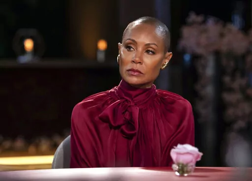Jada Pinkett Smith appears on an episode of her online series "Red Table Talk." The latest episode, streaming Wednesday, June 1, 2022 on Facebook Watch, addresses Alopecia. (Jordan Fisher/Red Table Talk via AP)