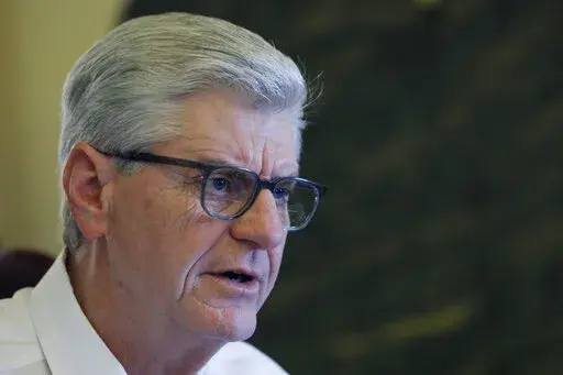 Gov. Phil Bryant speaks about his legacy following a life of public service, Jan. 8, 2020, in his office at the Capitol in Jackson, Miss. Newly revealed text messages show how deeply involved the former Mississippi governor was in directing more than $1 million in welfare money to retired NFL quarterback Brett Favre. The texts were in court documents filed Monday, Sept. 12, 2022, in state court by an attorney for the nonprofit known as the Mississippi Community Education Center. (AP Photo/Rogeli