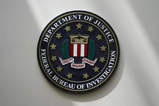 The FBI seal is pictured in Omaha, Neb., Aug. 10, 2022. FBI officials repeatedly violated their own standards when they searched a vast repository of foreign intelligence for information related to the insurrection at the U.S. Capitol on Jan. 6, 2021, and racial justice protests in 2020. That's according to a heavily blacked-out court order released Friday, May 19, 2023. FBI officials said the violations predated a series of corrective measures that started in the summer of 2021 and continued la